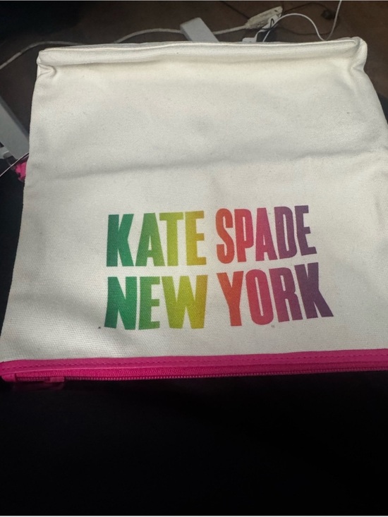 kate spade Handbags - kate spade White Wristlet Clutch with Pink Trim and Multicolor Logo